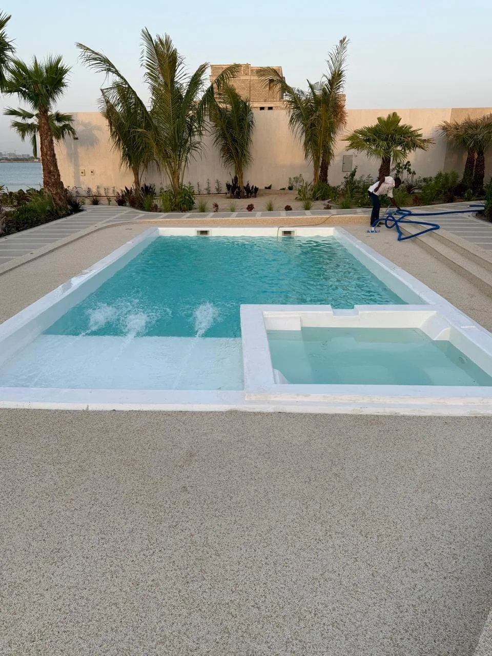 Completed villa pool and jacuzzi with a beachfront outlook